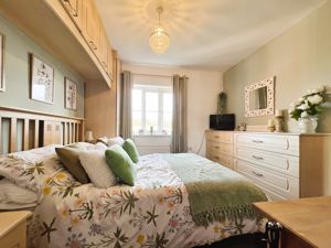 Bedroom One- click for photo gallery